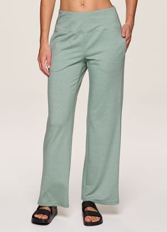 Whether you pair it with your favorite denim jacket or a sports bra for yoga, our Lotus Wide Leg Pant is the ultimate studio-to-street piece. A relaxed, wide leg design keeps you comfortable and on trend while the flat-front elastic waistband ensures an ultra flattering look and fit without sacrificing comfort. Complete with side pockets that provide the functionality you're looking for, you can unwind and reset in these versatile women's sweatpants. Full Length 4-way Stretch Pants For Loungewear, Wide-leg Yoga Pants With Pockets For Loungewear, Casual Bottoms With Pockets For Relaxation, Wide Leg Activewear With Pockets And 4-way Stretch, Spring Sweatpants For Relaxation With Elastic Waistband, Comfortable Sweatpants For Spring Relaxation, Spring Sweatpants With Elastic Waistband For Relaxation, Solid Wide Leg Pants For Spring Lounging, Solid Color Wide Leg Pants For Spring Lounging