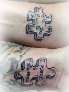 two matching tattoos on their arms with the words you are my friend