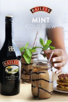 a bottle of bailey's mint cold brew next to some cookies and desserts