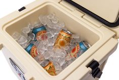 an ice cooler with several cans of beer in it's lid and some ice on the inside