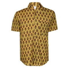 Our Amber Amer Men's shirt is so super soft and such a great colour combination. We have named it after the Amer Fort in Jaipur where this shirt is made. Block printers in Jaipur have practiced this art for centuries. This shirt will be a favourite for the summer! 100% cotton Wash cold, hang dry. Made in India This fabric is block printed by hand so slight variations in printing may exist which demonstrate the hand made aspect of this product. Traditional Fit Short Sleeve Shirt, Traditional Printed Yellow Tops, Festive Yellow Cotton Top, Festive Short Sleeve Cotton Shirt, Festive Cotton Short Sleeve Shirt, Traditional Cotton Shirt For Festivals, Traditional Relaxed Fit Cotton Shirt, Traditional Printed Shirt For Festivals, Traditional Tops With Relaxed Fit And Camp Collar