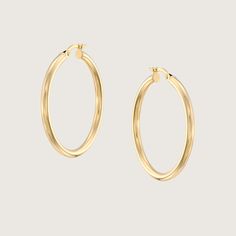 Our simple yet elegant iconic hoop earrings. Timeless and classic, fits any outfit and any occasion. Made out of 14K gold, open and close with a strong mechanism. Safe, simple and comfortable. Available in a variety of sizes - from minimalistic everyday size to big statement hoops. The earrings are sold as singles Perfect for the everyday casual chic look, they can also be worn to top off an exquisite evening look. All of our jewelry is carefully handmade in our atelier To order by phone 972-72-2991000 Modern 14k Gold Hoop Earrings For Everyday Elegance, Timeless Small Hoop Earrings For Everyday, Minimalist 14k Gold Hoop Earrings For Formal Events, Minimalist 14k Gold Hoop Earrings For Formal Occasions, Formal Minimalist 14k Gold Hoop Earrings, Classic Small Hoop Earrings For Everyday, Timeless Hoop Earrings For Everyday Elegance, Timeless Hoop Earrings For Everyday Luxury, Classic Hypoallergenic Hoop Earrings For Everyday