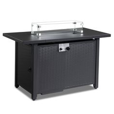 an outdoor bbq table with two burners on the top and one open drawer