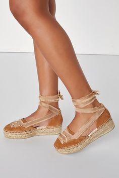 Whether you're hitting the beach or just grabbing drinks, the Free People Destino Peachy Sand Suede Lace-Up Espadrille Platforms will be the epitome of summer style this season! Soft genuine suede leather shapes a rounded toe upper adorned with fringe-trimmed ribbons that create a decorative lace-up design and thread through the matching heel cup to wrap and tie above the ankle. A summery, espadrille-wrapped platform sole lends an ultra-Boho finish! Available in Euro sizes only. 1. 75" espadrill Beige Espadrilles For Beach Season, Beach Season Beige Espadrilles, Gold Espadrilles For Summer Vacation, Gold Summer Espadrilles For Vacation, Summer Vacation Gold Espadrilles, Gold Espadrilles For Beach Summer, Gold Espadrilles For Spring Beach Outing, Gold Espadrilles For Beach In Spring, Gold Espadrilles For Beach And Spring Season