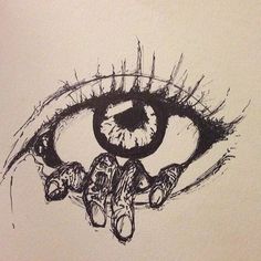 a drawing of an eye that is drawn on paper