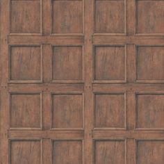 a wooden paneled wall with squares and rectangles on the top, in brown tones