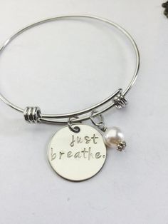 Just Breathe Hand Stamped Expandable Bracelet- Stainless Steel-Yoga Bracelet- Mindfulness-Peaceful-M Spiritual Round Stainless Steel Bracelets, Meaningful Round Stainless Steel Jewelry, Inspirational Nickel-free Stainless Steel Jewelry, Nickel-free Stainless Steel Round Charm Bracelet, Inspirational Adjustable Round Jewelry, Inspirational Round Adjustable Jewelry, Inspirational Hypoallergenic Jewelry, Breathe Bracelet, Peaceful Meditation