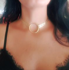 "♦ A beautiful choker necklace, made of metal gold-plated brass in a very high quality with a hoop pendant in its center. SIZA: length 11.8 \" (30 cm) up to 15.8\" ( 40 cm) wide chain 0.47 \" ( 1.2 cm) ♦ This piece of jewelry is perfect as a gift for yourself, for a wedding day, Valentine's day or a birthday. ♦ The jewel will be sent by registered mail (to some countries also includes a tracking number), more information in the F&Q. ♦ My Etsy Shop: http://etsy.me/2rdJm27 Thank you for your i Gold-tone Round Jewelry For Party, Gold Circular Jewelry With Adjustable Chain, Gold Hoop Jewelry For Party, Nickel Free Metal Choker, Gold Circular Metal Ring Jewelry, Metal Round Choker For Party, Metal Choker For Party, Gold Plated Clavicle Chain Jewelry, Gold Circle Jewelry For Festivals