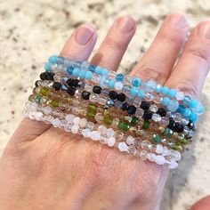 These stunning pieces really dance in the light... A sparkling mixture of faceted jade, crystals in various shapes with Czech glass for added sparkle. A true show stopper whether you wear alone or mix with other pieces. Hints of genuine Aquamarine in the Aqua bracelets and Citrine in the Olive bracelets. 🌙 Special pricing when you purchase 2. 🌙 Buy one for a delicate look or several for a stackable, layered look. Looks great paired with my multi wrap bracelets! My pieces are made sturdy, but a Adjustable Faceted Crystal Bracelet With Round Beads, Spiritual Party Bracelets With Faceted Beads, Clear Crystal Bracelet With Round Faceted Beads, Spiritual Faceted Beads Bracelet For Party, Adjustable Gemstone Beads Crystal Bracelets, Spiritual Party Beaded Bracelets With Faceted Beads, Party Crystal Bracelet With Faceted Beads, Spiritual Faceted Beaded Bracelets For Party, Spiritual Faceted Beads Crystal Bracelet For Jewelry Making