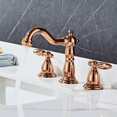 two faucets are shown in this bathroom