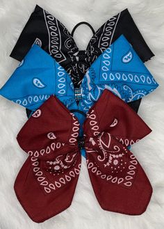 Custom bandana cheer bows, come in a wide variety of colors.  All are attached to a no metal ouchless elastic hair band.  Please message me with desired color, would like to request a color not listed or if you would like to purchase multiple. Christmas Cheer Bows, Bandana Bow, Elastic Hair Bands, Making Hair Bows, Cheer Bows, Diy Hair Bows, Diy Bow, Hair Band, Hair Ties