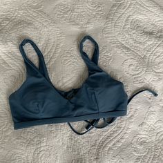 This Bikini Top Is In Great Condition And Was Never Worn. It Comes With Pads And Can Be Removed. The Straps Are Not Functional, However It Has A Functional Tie In The Back. Blue Beachwear Swimwear With Straps, Blue Underwire Swimwear With Straps, Blue Triangle Top Swimwear Bra Friendly, Blue Triangle Top Tankini, Bra Friendly, Blue Triangle Top Tankini With Bra Support, Blue Fitted Bra Friendly Tankini, Blue Fitted Bra-friendly Tankini, Blue Triangle Top Swimwear With Built-in Bra, Blue Beachwear Tankini With Padded Cups