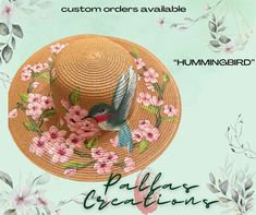 Unique one of a kind hand painted straw hat.  This hummingbird and cherry blossoms will  complete your Spring, Summer, and festival outfit. This hat goes with everything.  beach, vacation, Easter, Coachella, Mother's Day, Kentucky Derby, special gift, or perfect for yourself. These hats have an adjustable string in the hat band to insure one size can fit all. Protect yourself from the sun with a uniquely designed Pallas Creations hat. Each one is custom hand painted with acrylic enamel paint just for you so the design and colors may differ slightly.   Follow us on Etsy and Facebook.  We are always adding and changing designs to create trending and unique designs. Instructions are easy: If you would like any color changes or customization please let us know in an email.  Additional charges Handmade Flower Hats For Summer, Whimsical Brimmed Sun Hat For Summer, Whimsical Straw Hat For Spring Vacation, Whimsical Straw Hat For Spring Beach, Whimsical Straw Hat For Spring Beach Outings, Whimsical Straw Hat For Beach In Spring, Whimsical Spring Vacation Hats, Whimsical Sun Hat With Curved Brim For Spring, Artisan Hat For Spring Vacation