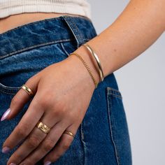 Introducing our Milgrain Cuff, a must-have for your arm party! This essential accessory boasts delicate milgrain detailing along its edges, exuding a timeless vintage aesthetic. She can be delicately shaped to perfectly contour your wrist. The perfect push present gift, bridesmaid gifts or gift it to yourself! What is Gold Filled? Gold Filled is 5% gold by weight, which is 100x more gold than gold-plating. Gold filled is hypoallergenic, tarnish-resistant, durable, will last for years to come, an Gold Arm Cuff, Push Present, Gold Cuff Bracelet, Layered Bracelet, Cuff Bracelets Handmade, Dainty Bracelet, Arm Party, Gold Bracelet Cuff, Arm Cuff