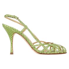 Dolce&Gabbana fresh green snakeskin strappy shoes. Thin straps create a woven design across the toe of the sling back shoe. Shaped heel. final sale SIZE 37.5 USA SIZE 7.5 SHOE MEASURES: HEEL 4" UPPER SOLE 9.74" CONDITION: MINT Chic High Heels, Ankle Tie Sandals, Satin Noir, Strappy Shoes, Dolce Gabbana Shoes, Black Leather Pumps, Slingback Shoes, Kinds Of Shoes, Fabulous Shoes