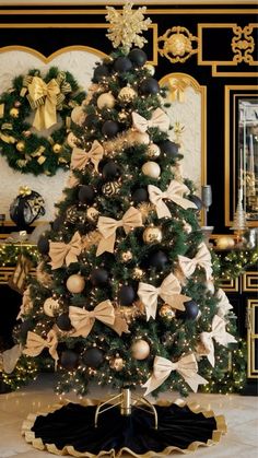 a christmas tree decorated with black and gold ornaments