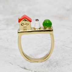 Show off your love for fairy tales with this enchanting Snow White Ring! Coco and Duckie thoughtfully curated this art piece that was lovingly crafted by truly imaginative artisans in Paris. Be unique by adding this fun ring to your jewel box! • Size 6, 18k gold plated• Clean with a soft jewelry polishing cloth. Never clean with any chemicals, chlorine or bleach.• Handmade in Paris Want to see more from N2 Paris? Click here! Whimsical Gold Ring Jewelry, Hand Painted Gold Enamel Rings, Hand Painted Enamel Gold Rings, Gold Enamel Hand Painted Rings, Gold Enamel Ring For Anniversary, Hand Painted Enamel Wedding Jewelry, Hand Painted Enamel Jewelry For Wedding, Gold Enamel Anniversary Ring, Hand Painted Enamel Jewelry For Weddings