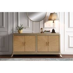 the sideboard is made from wood and has two doors