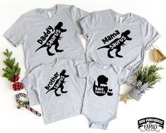 Get your dinosaurs shirts, pack your dinosaur crew, and hit the road! A perfect matching family outfit gift for daddy, mommy and baby saurus! Check out our full collection of awesome family shirt sets here: https://www.etsy.com/shop/MyFuntasticFamily?mcnav&section_id=29632816 HOW TO ORDER: All shirts are added individually to the basket. * Choose shirt variant/text. * Choose size & model. * Write the shirt color to the personalisation box. * If chosen, write the custom name there also. * Grandparent Shirts, Grandparents Shirt, Address Change, Matching Christmas Shirts, Dinosaur Shirt, Grandpa Shirt, Granddaughter Gift, Baby T Shirts