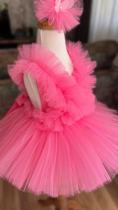 🌸 Discover our Magical Pink Tutu Dress—perfect for babies and toddlers! 🌸

Our Pink Tulle Dress is a delight for first birthdays, Halloween, festivals, special events, and as a charming toddler costume.

👑 Ultimate Comfort: Soft tulle outside, cotton-lined inside to avoid irritation—pure comfort for your little fairy.

🌟 Perfect Fit: With adjustable straps and elastic waist, it's customizable for a snug and comfy fit.

💖 Crafted with Love: Made with care, this fairy dress is a standout piece.

🌈 Key Features:
🎈 Premium Quality: Luxurious, durable fabrics.
🎈 Growth-Friendly: Adjustable features accommodate growth.
🎈 Easy Care: Cold water wash for lasting beauty.

Order now and let your little one dazzle as the star of her special day! 💫 Easter Birthday Princess Dress With Ruffles, Pink Princess Dress For Birthday And Easter, Pink Tulle Dress For Easter, Fitted Ruffled Tutu Dress For Easter, Easter Party Tutu Dress With Ruffles, Pink Playful Princess Dress For First Birthday, Playful Pink Princess Dress For First Birthday, Princess Style Tutu Dress For Easter Party, Red Ruffled Tutu Dress For First Birthday