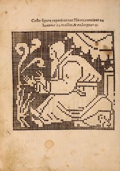 an old book with a cross stitch pattern on it