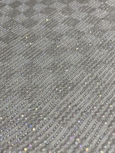 Distinguished by its luxurious design, this high-quality Aluminum Sequin & Beads On Silk Chiffon JEC-069-6 Fabric is perfect for women's high-end evening dresses, costumes, jackets, and skirts. Our unique and distinctive fabric is available in a wide selection of colors. The fabric is sold by the Yard, and measures 44 inches in width. Luxury Women's Sequin Fabric For Evening, Luxury Sequin Fabric For Women, Luxury Silver Sequin Fabric, Luxury Silver Sequin Fabric For Party Season, Dupioni Silk, Luxurious Design, Silk Wool, Sequin Beading, Abayas Fashion