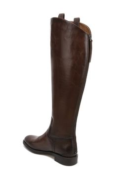 A low heel and rounded toe balance this versatile riding boot made from rich leather. 1" heel 16" shaft; 14 1/2" calf circumference Back zip closure Leather upper/synthetic lining and sole Imported Women's Shoes Riding Boot, Wide Calf, Franco Sarto, Stacked Heel, Low Heels, Knee High Boots, Riding Boots, Knee High, Women's Shoes