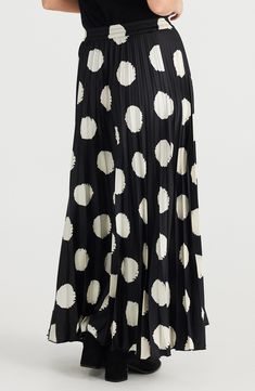 Accordion pleats and playful polka dots make this sweeping skirt an instant standout style. 38" length (size Medium) Elastic waist Unlined 100% polyester Hand wash, line dry Imported Polka Dot Relaxed Midi Skirt, Flowy Polka Dot Midi Skirt, Chic Long Skirt With Polka Dot, Polka Dot Pleated Skirt For Spring, Relaxed Fit Polka Dot Skirt, Elegant Polka Dot Flowy Skirt Bottoms, Polka Dot Tiered Lined Skirt, Chic Polka Dot Relaxed Skirt, Chic Polka Dot Relaxed Fit Skirt