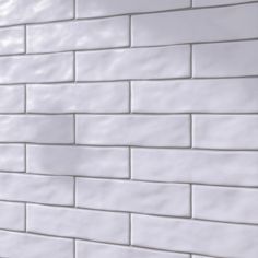 a white brick wall is shown in this image