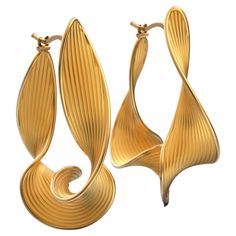 Discover our exclusive made-to-order Statement Twisted Hoop Earrings in 14k gold, meticulously handcrafted in Italy by Oltremare Gioielli. These unique, long twisted hoops feature a captivating ribbed surface and polished edges, embodying a perfect fusion of contemporary design and timeless sophistication. These Italian-made earrings are a true testament to individual style and craftsmanship, ensuring you stand out with every wear. 44 mm long beautiful hoop earrings crafted in polished and raw solid gold 18k or 14k Click top closure Gold hoop earrings made in Italy. The earrings are secured by a trusty snap closure. The approximate total weight is 14 grams in 18k Additional Information: The production time of this jewel varies from 3-4 working weeks. •Orders placed in the second half of Ju Gold Jewelry Italian, Italian Jewellery Design, Fashion Png, Italian Gold Jewelry, Gold Jewels Design, Rare Jewelry, Twisted Hoop Earrings, Italian Jewelry, Jewellery Ideas