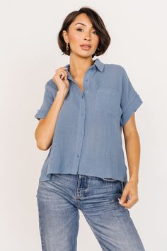 Blue Collared Top With Roll-up Sleeves, Blue Button-up Blouse For Everyday, Everyday Blue Button-up Blouse, Blue Shirt With Roll-up Sleeves And Shirttail Hem, Everyday Blue Blouse With Pockets, Blue Casual Tops With Roll-up Sleeves, Casual Blue Tops With Roll-up Sleeves, Washed Blue Tops With Relaxed Fit, Blue Collared Top With Pockets