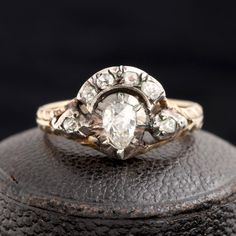 Antique Cluster Ring With Rose Cut Diamonds, Victorian Diamond White Ring With 17 Jewels, Victorian Style Diamond Ring With Diamond Cut, Elegant Ceremonial Diamond Ring, Ornate Baroque Jewelry With Rose Cut Diamonds, Vintage Pear-shaped Diamond White Jewelry, Antique Baroque Jewelry For Wedding, Antique Marquise Rose Cut Diamond Ring, Classic Rose Cut Diamond Rings For Ceremonial Occasions