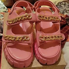 Pink Sandal Vacation Sandals With Chain Strap And Round Toe, Vacation Sandals With Chain Strap, Trendy Beach Sandals With Chain Strap, Flat Sandals With Chain Strap And Synthetic Material, Vacation Sandals With Chain Strap And Synthetic Material, Synthetic Sandals With Chain Strap For Vacation, Spring Sandals With Chain Detail And Round Toe, Spring Chain Sandals With Round Toe, Trendy Chain Sandals For Summer