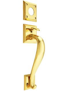 a gold door handle on a white background