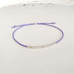 Minimalist, wearable and delicate silver multicolor thread bracelet available in several colors. Length: 20cm adjustable knot. Width: 2mm. Fully adjustable, Handmade in Spain. More colors available in this product => https://www.etsy.com/listing/845364478/tiny-simple-cord-sterling-silver-wish Ideal for a gift and for combinate with other bracelets. All our products are presented in a white organza bag. ♡ Made with love in Valencia ♡ ----------------------------- Discover the NICTE bracelets c Adjustable Friendship Bracelets With Silver Beads As Gift, Minimalist Adjustable Friendship Bracelets, Silver Beaded Bracelets With Sliding Knot, Sterling Silver Friendship Bracelet With Sliding Knot, Dainty Silver Friendship Bracelets With Round Beads, Sterling Silver Adjustable Friendship Bracelets, Everyday Adjustable Sterling Silver Friendship Bracelets, Minimalist Silver Bracelets With Sliding Knot, Silver Minimalist Bracelet With Sliding Knot