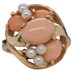 Item Details: Ring Size: 9 Metal Type: 14k Yellow Gold [Hallmarked, and Tested] Weight: grams ‌ Coral Details: Weight: 3.00ct, total weight Cut: Oval Color: Pinkish Orange ‌ Band Width: 1.5 mm Condition: Excellent Pearl Cluster Ring, Pinkish Orange, Contemporary Ring, Pearl Cluster, Cluster Ring, Types Of Metal, Jewelry Inspiration, Metallica, Jewelry Rings