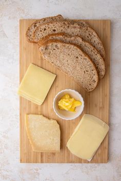 bread and butter on a wooden cutting board