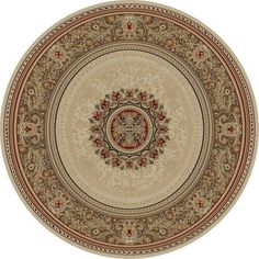 a round rug with an ornate design on the center and sides, in beige tones