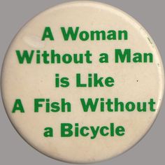 a woman without a man is like a fish without a bicycle pinback button badge