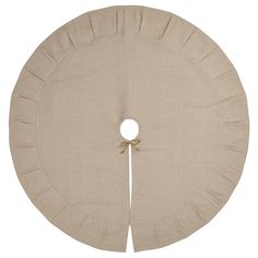 a round cushion with a knot on the side and a hole in the middle that is attached to it