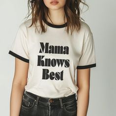 One Tough Mother Funny Graphic Tee Mama Knows Best Funny Mama Tee These custom ringer t-shirts are an all-time classic that offers clean style and a whole lotta attitude in one timeless package. Made with 100% ring-spun cotton, each tee comes with a contrasting 1x1 baby rib binding on the collar and sleeves to give it that classic style. 100% combed, ring-spun cotton Light fabric Classic fit Tear-away label Black T-shirt With Lettering For Summer, Retro Crew Neck T-shirt With Lettering, Retro Crew Neck Top With Text Print, Trendy Short Sleeve Top With Lettering, Classic Cotton T-shirt With Letter Print, Trendy T-shirt With Lettering For Streetwear, Trendy Streetwear T-shirt With Lettering, Trendy Short Sleeve T-shirt With Lettering, Vintage Crew Neck Tops With Lettering