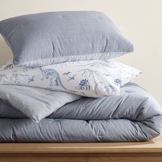 three pillows stacked on top of each other