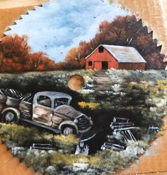 a painting of an old truck in a field with a barn and red building behind it