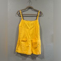 Urban Outfitters, Size M, Brand New And Never Worn. Summer Sundress With Pockets For Spring, Spring Sundress With Pockets For Summer, Yellow Mini Dress With Spaghetti Straps For Summer, Yellow Spaghetti Strap Mini Dress For Summer, Sundress With Pockets For Day Out, Summer Sundress With Pockets, Spring Sleeveless Sundress With Pockets, Summer Vacation Mini Dress With Pockets, Spring Sundress With Pockets