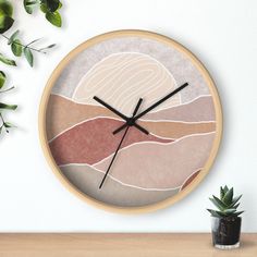 a wall clock with an abstract design on it