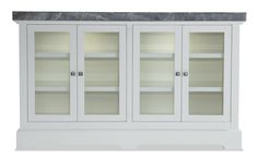 a white bookcase with glass doors and marble top on an isolated white background for display