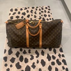 Louis Vuitton Keepall Monogram Lv Luggage Duffel Bag Size 50 Made In France Date Code: Fl0052 Circa 2002 Comes With Everything Seen! Great Condition! Comes With: *Lv Luggage Tag & *Lv Lock & Key Guaranteed Authentic! Free Shipping! Designer Monogram Canvas Travel Bag With Luggage Sleeve, Luxury Brown Luggage With Dust Bag Included, Monogram Canvas Travel Bag, Designer Monogram Canvas Luggage For Everyday Use, Designer Brown Travel Bag With Large Capacity, Luxury Shopping Travel Bag With Luggage Sleeve, Designer Brown Luggage For Travel, Luxury Brown Luggage With Large Capacity, Luxury Large Capacity Brown Luggage