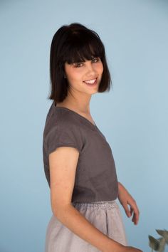 MsWrinkle’s clothing – from human to human.  100% handmade.*Description*- Simple linen top with short sleeves, V neckline and seam on the front and back;- High quality European linen;- Washed and softened (doesn't shrink anymore);- Medium weight linen (150 g/m2);- Our linen is OEKO-TEX certified that meets human ecological safety requirements;- Model is wearing size S in dark brown, elephant grey, white, sky blue and greenish mustard (other sizes and colors please choose on the right);- Not tran Summer Cotton V-neck Top With Relaxed Fit, Cotton V-neck Summer Top, V-neck Cotton Top For Summer, Casual V-neck Fitted Top, Versatile Fitted V-neck Top, Summer Cotton V-neck Top With Short Sleeves, Summer Linen V-neck Tops, V-neck Cotton Short Sleeve Top, Relaxed Fit Short Sleeve V-neck Top For Summer