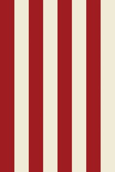 a red and white striped wallpaper with vertical stripes on the bottom half of it