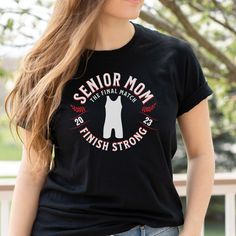 A unique and inspirational wrestling senior mom shirt - perfect to wear to senior night. The year is updated annually! DETAILS: Unisex Soft-style T-Shirt - for men and women Brand: Gildan; Unisex Tee Material: 100% Ringspun Cotton, Heather Gray 35/65 Cotton/Polyester Care: Machine Wash Cold. May shrink slightly after the first wash. UNISEX SIZES: **Please see the size chart with detailed measurements in the photo gallery and measure against your favorite t-shirt.** SIZING DETAILS: * If you are not sure about sizing please measure your favorite t-shirt and compare measurements to the chart for the best fit for you. * Most styles offered are preshrunk at the factory but may shrink some after washing and drying. Always air dry or tumble dry on the lowest heat setting for the least amount of s Senior Mom Gifts, Wrestling Senior Night, Senior Night Shirts, Wrestling Banquet, Wrestling Senior Pictures, Senior Mom Shirt, Wrestling Attire, Girls Wrestling, Wrestling Mom Shirts